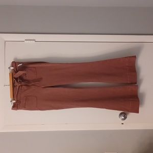 Clearance SaleExpress flare pants with tie-front. Regular length but seem "long"